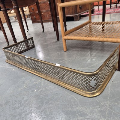 Lot 208 - An antique brass fire fender H 13 W 90 D 38cm