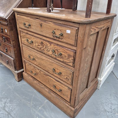 Lot 215 - A small antique pitch pine chest of four...