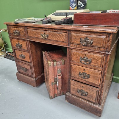 Lot 1859 - A late Victorian oak pedestal desk, the...