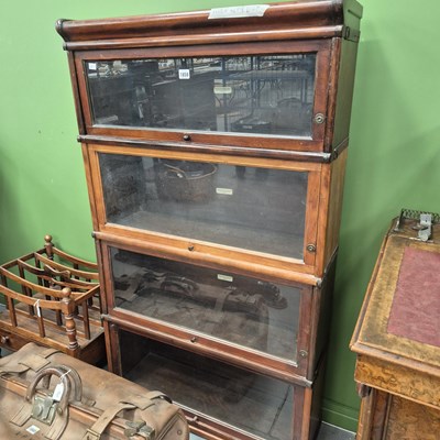 Lot 1858 - An antique mahogany four section Globe...