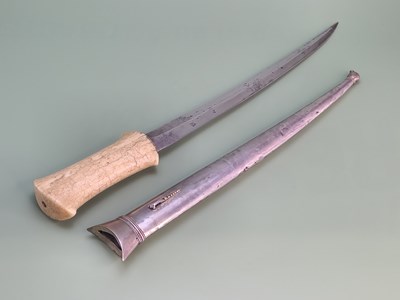 Lot 1356 - An Ottoman dagger in a metal scabbard, the...