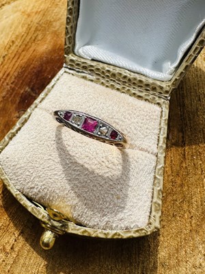 Lot 1006 - An Art Deco ruby and diamond ring, the...