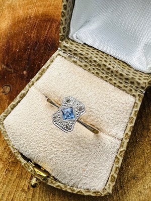 Lot 1016 - An Art Deco sapphire and diamond ring, centred...