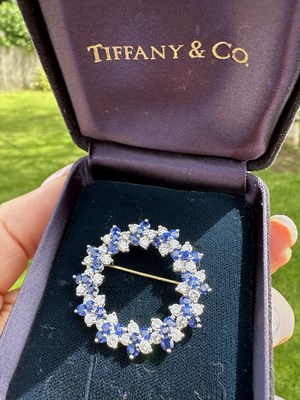 Lot 1017 - Tiffany & Co: a platinum sapphire and diamond...