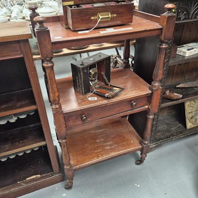 Lot 224 - A late Victorian mahogany whatnot of three...