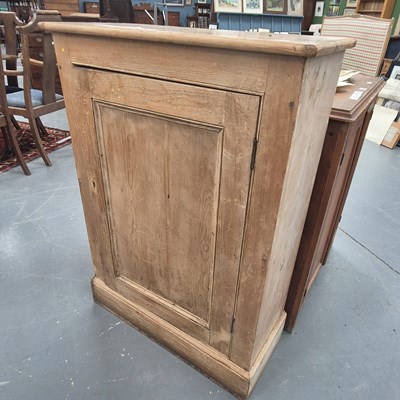 Lot 228 - An antique pine single door floor standing...