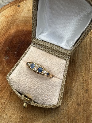 Lot 1084 - A Victorian sapphire and diamond five-stone...