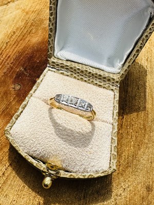 Lot 1098 - A diamond five-stone ring, set with five...