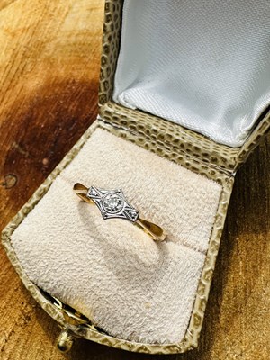 Lot 1099 - An Edwardian diamond dress ring, centred with...