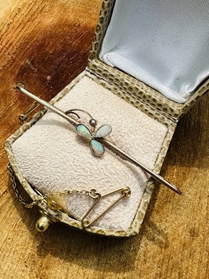Lot 1110 - An Edwardian opal and seed pearl bar brooch,...