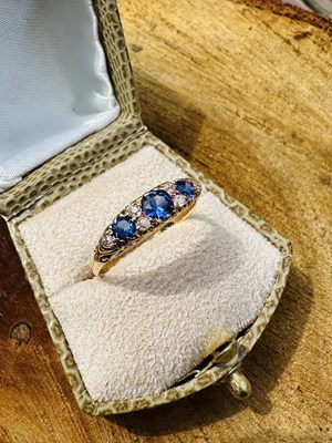 Lot 1116 - A Victorian sapphire and diamond ring, set...