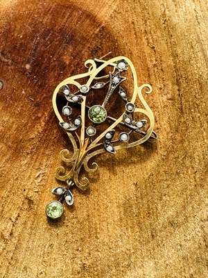Lot 1129 - An Edwardian gem-set and seed-pearl pendant...