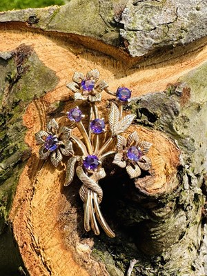 Lot 1135 - A Mid-20th-century amethyst floral spray...