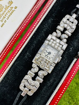 Lot 1147 - An Art Deco diamond cocktail watch, the...