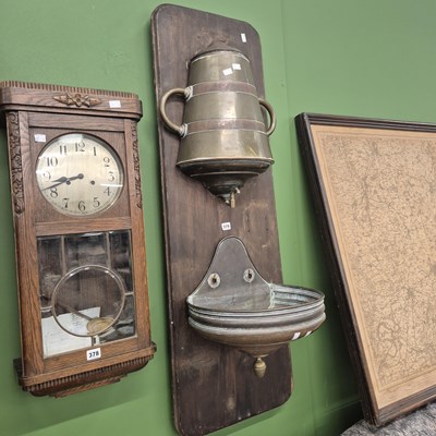 Lot 379 - A Continental copper and brass lavabo mounted...