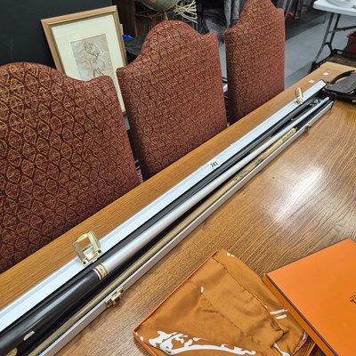 Lot 383 - A cased Riley oak snooker cue bearing the...
