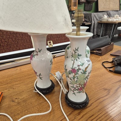 Lot 384 - Three oriental style baluster vase table lamps...