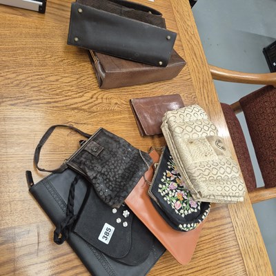 Lot 385 - A collection of ten handbags, wallets, purses...