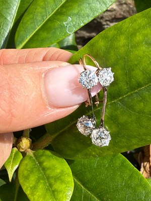 Lot 1271 - A pair of antique old-cut diamond drop...