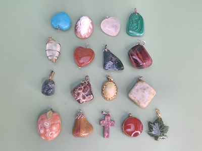 Lot 1288 - A vintage rose carved cameo panel and a...