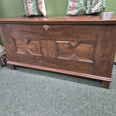 Lot 389 - An antique oak panel coffer on bracket feet H...