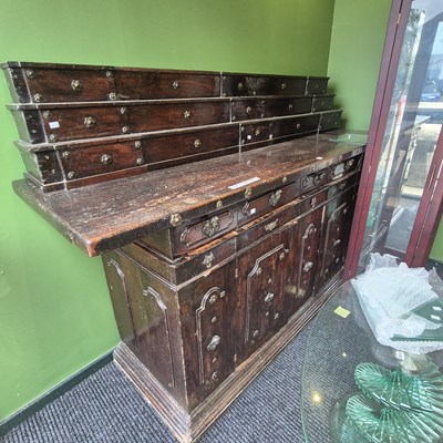 Lot 423 - An antique Italian hardwood step backed brass...