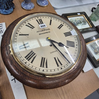 Lot 809 - An oak framed wall timpiece inscribed 'Murphie,...