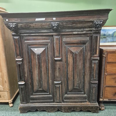 Lot 278 - A large antique Flemish carved oak two door...