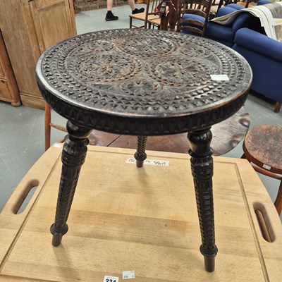 Lot 240A - An Arts and Crafts three legged hardwood stool...