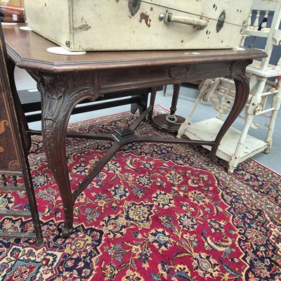 Lot 249 - A mahogany table stamped for Howard & Sons,...