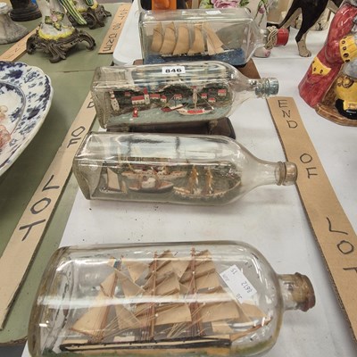 Lot 846 - Four ships in bottles