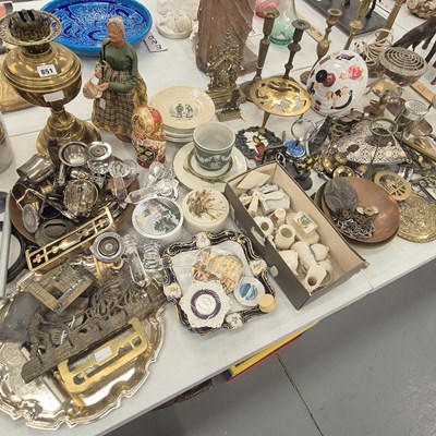 Lot 851 - A brass oil lamp, candlesticks and other brass...