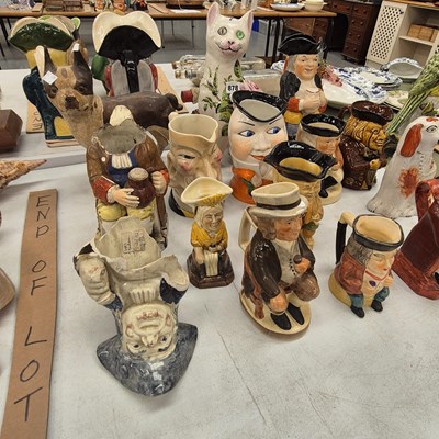 Lot 878 - A collection of Toby jugs, two dog figures,...