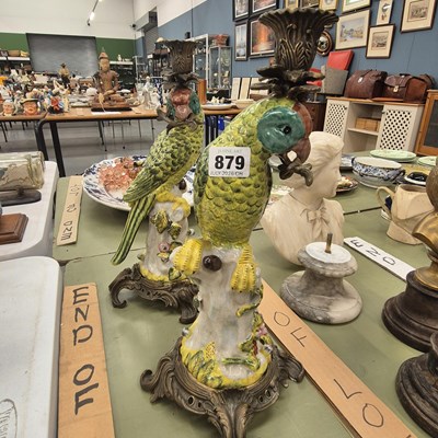 Lot 879 - A pair of gilt metal mounted ceramic parrot...