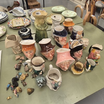 Lot 881 - A collection of character and Toby jugs,...