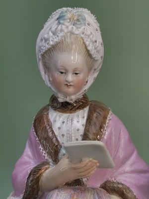 Lot 1596 - A pair of Meissen lace trimmed porcelain...
