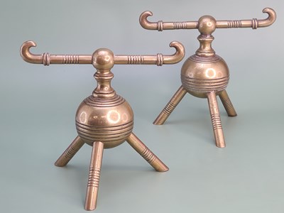 Lot 1585 - A pair of Christopher Dresser design brass...