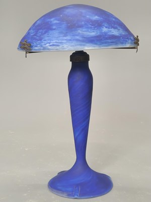 Lot 1586 - A 'Le Verre Francais' blue swirl glass table...