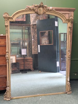 Lot 1571 - A 19th century gilt framed mirror, the round...