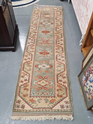 Lot 439 - A Turkish tribal runner 290 × 81cm
