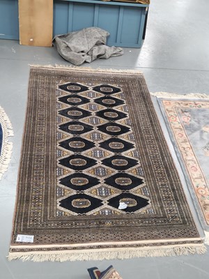 Lot 447 - An Oriental rug of Bokhara design 206 × 125cm