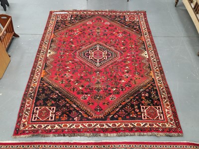 Lot 435 - A Persian Shiraz rug 237 × 178cm