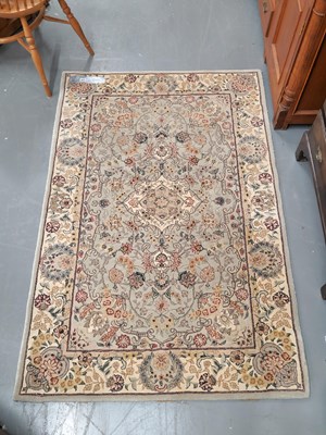 Lot 437 - A knotted rug of Persian design 178 × 117cm
