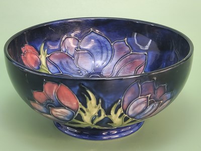 Lot 1808 - A Walter Moorcroft deep blue ground bowl slip...