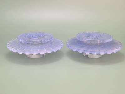 Lot 1812 - A pair of R Lalique blue tinted dahlia pattern...