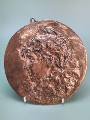 Lot 1584 - An antique brass relief portrait plaque,...