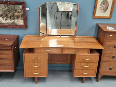 Lot 15 - A mid century teak triple mirror dressing...