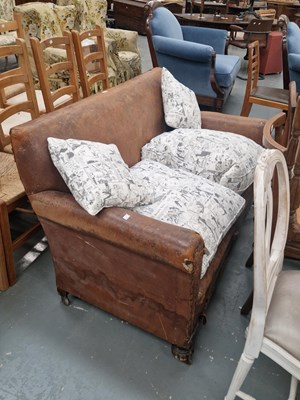 Lot 45 - An early 20th century leather two seat sofa...