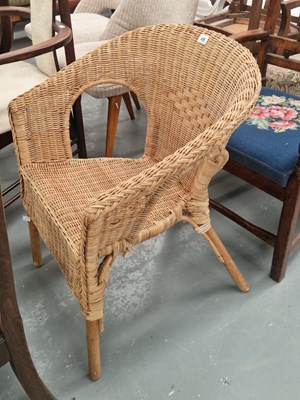 Lot 49 - A vintage wicker armchair in the style of Dryad