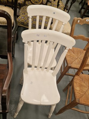 Lot 53 - A pair of painted slat back kitchen chairs on...